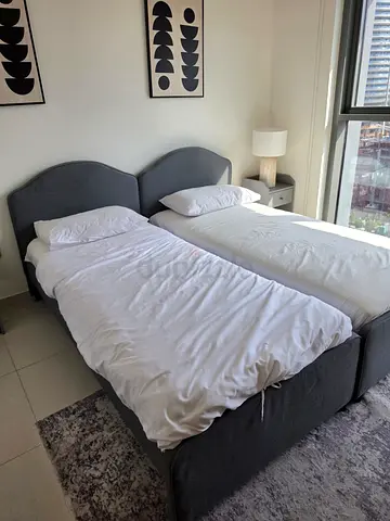 Modern Twin Beds with Upholstered Grey Headboards