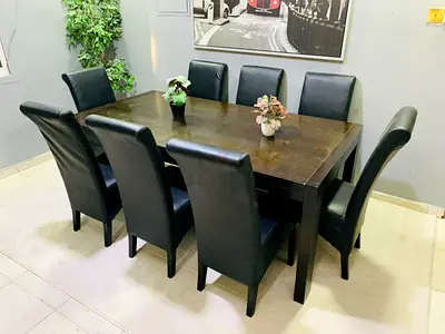 Solid Wood 8-Seater Dining Table with Black Leather Chairs