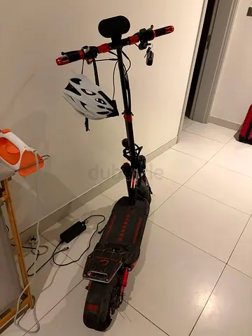 Kugoo Electric Scooter 48V - 8 Months Old, Helmet and Charger Included