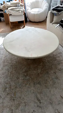 Round white coffee table / ottoman