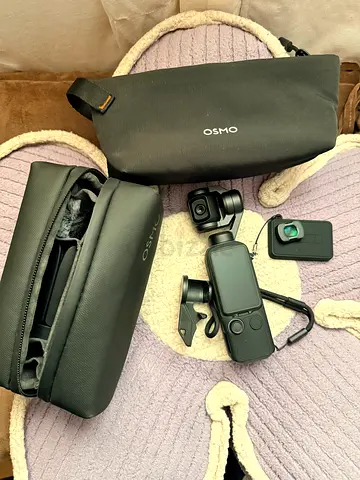 DJI Osmo Pocket 4 with Case and Accessories - Good Condition- slightly used