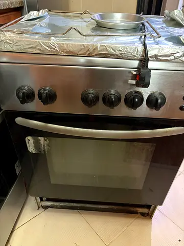 Used freestanding gas oven and stove, stainless steel, good working condition