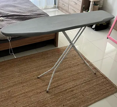 Used full-size ironing board with cover - good condition