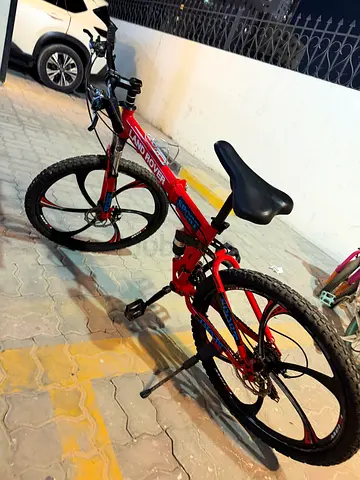 Red folding mountain/commuter bike - good working condition