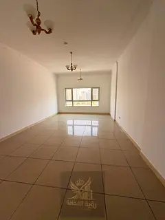 A spacious three-bedroom apartment with a living room is available for annual rent in Al Majaz 3, in