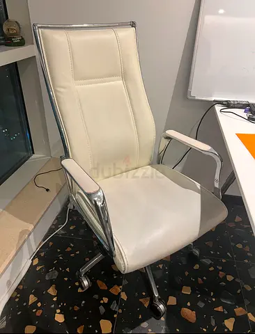 White leather high-back office chair with chrome frame