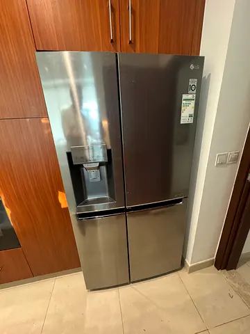 LG Stainless Steel Side-by-Side Refrigerator with Water Dispenser - Used