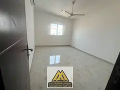 Annual 2BR for rent in Al Rawda 2, Ajman. Balcony, 2 baths, excellent split AC, and family building.