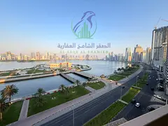 Four Bedroom Apartment for Rent in Al Majaz 3 Sharjah 5 Bathrooms Master Maid Room 2 Balconies Free 