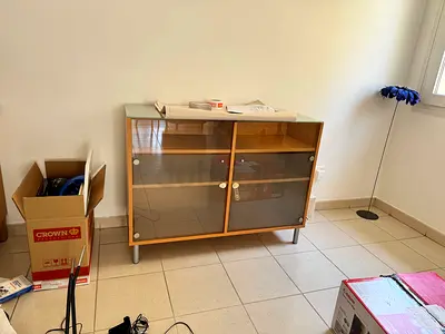 IKEA glass-front cabinet - light wood finish, good condition