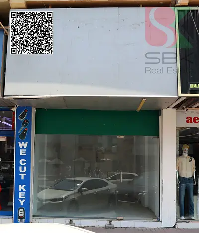 SPACIOUS SHOP FOR RENT – KARAMA PLAZA BUILDING, AL BUSTAN, AJMAN
