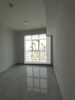 Great first-row 2BR apartment on Ajman Corniche with open view, 2 baths, balcony, wardrobes, central