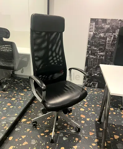 Black high-back ergonomic office chair — good condition