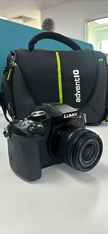 Panasonic Lumix G mirrorless camera with kit lens + AdventIQ camera bag