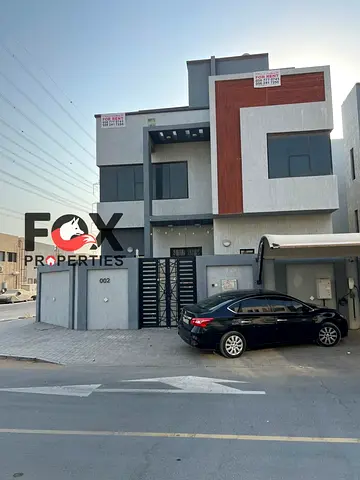 ارقي فيلا سكني بعجمان بسعر مميز / 5 غرف ماستر / باركينخ خارجي + شاحن كهربا داخلي / قريب من مخرج دبي