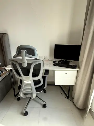 White desk with drawer and ergonomic office chair - used