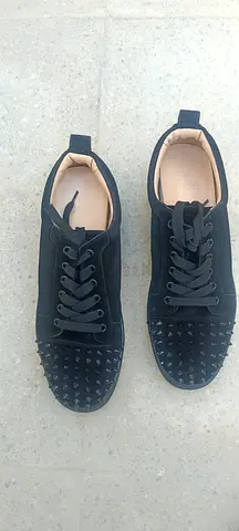 Black studded low-top sneakers - size unknown, gently used