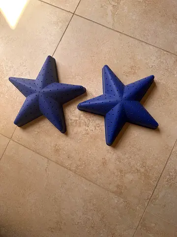 Set of 2 Blue Star-Shaped ikea wall lights.