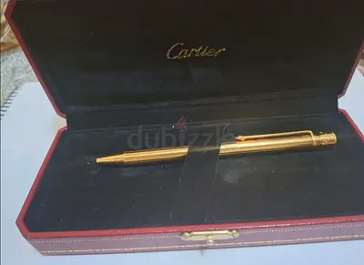 Cartier gold ballpoint pen in original case
