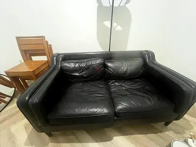 Black Leather 2-Seater Sofa — Good Condition