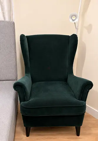 Used IKEA STRANDMON Wing Chair in Dark Green Velvet for 290 AED