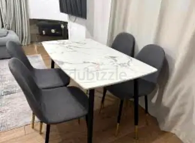 Wooden table with Marble-top finishing dining table with 4 grey upholstered chairs