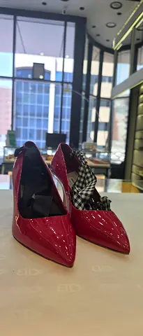 Red patent pointed-toe heels with gingham bow, size available