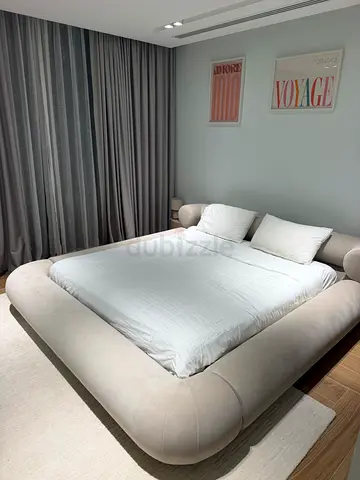 Beige Upholstered Rounded King Bed - Excellent Condition