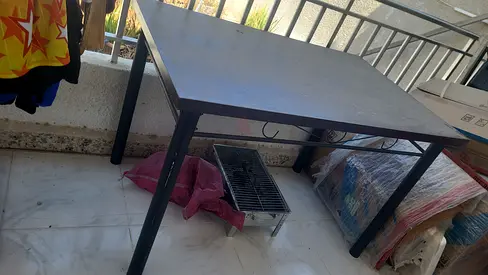 Simple rectangular dining table - black metal frame, white top (good condition)