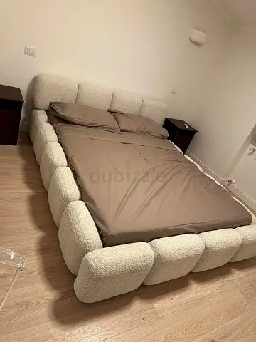 Low-profile boucle upholstered queen bed frame - cozy modern design