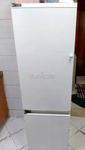 Used white refrigerator with bottom freezer - good working condition