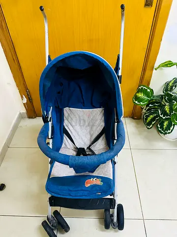 Lightweight blue baby stroller in good used condition