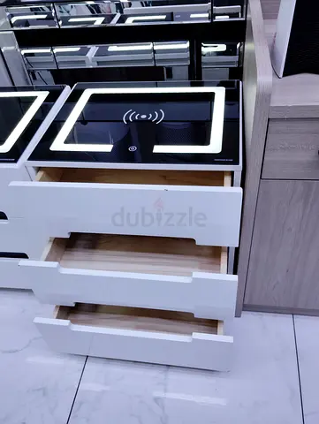 Modern white bathroom vanity with LED mirror and wireless charger, 3 drawers
