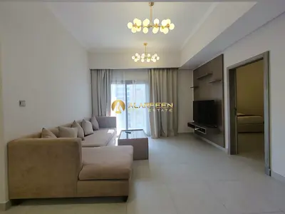 شقة مفروشة بغرفة نوم واحدة | برج باب JVC | شرفة مطلة على المدينة
