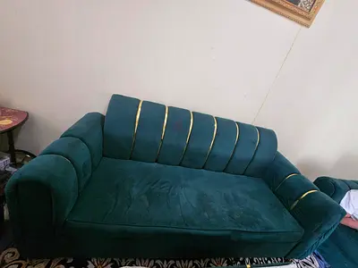 Green velvet 7-seater sofa with gold trim, good condition