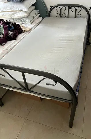 Folding bed with mattress