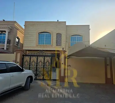 فيلا سكنية للبيع في الروضة 1 – عجمان | طابقين وروف 5 غرف نوم ماستر | مصعد | شاملة الكهرباء والمياه والمكيفات