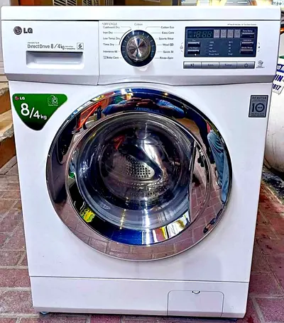 LG washer and dryer 8/4 combo Perfect working