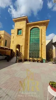 Freehold villa in Al Rawdah 2 featuring modern finishes, located directly opposite the mosque; inclu