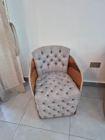 Ebarza Grey tufted accent armchair with wooden frame