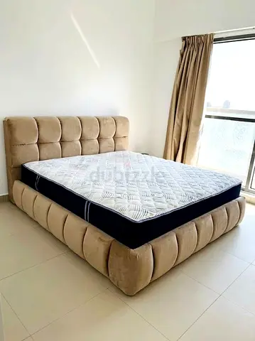 Queen size upholstered bed frame - beige velvet
