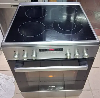 Siemens new latest model ceramic electric stove top 4 hobs 60by60cm size excellent working good cond