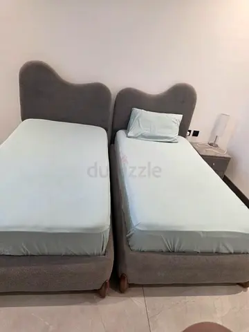 2 single Beds with Wavy Headboard - Grey Boucle Fabric - Like New - Can Sell Separately with matress