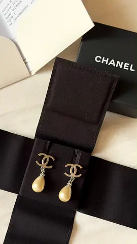 Chanel CC logo pearl drop earrings — authentic designer piece