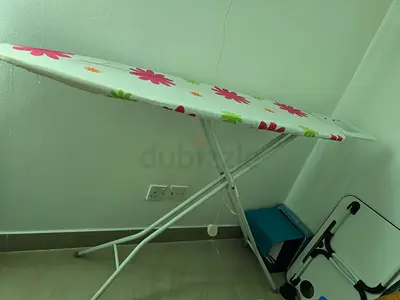 Foldable ironing board with floral cover - excellent condition