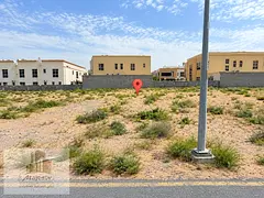 Land for sale in Al-Houshi – prime location.