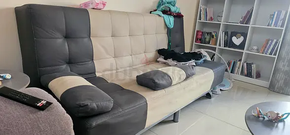 Convertible sofa bed in beige and dark grey - good condition
