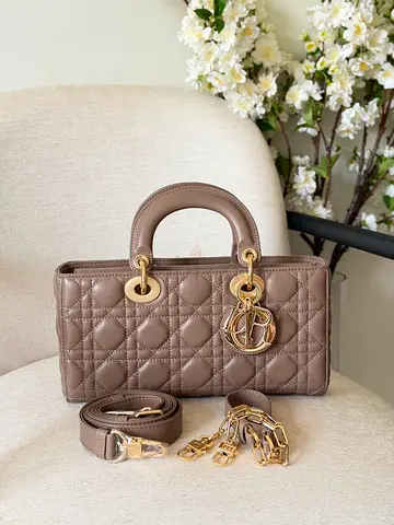 My gently used taupe quilted leather handbag with detachable straps