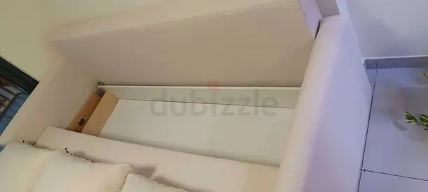 Light beige fabric sofa bed - good condition