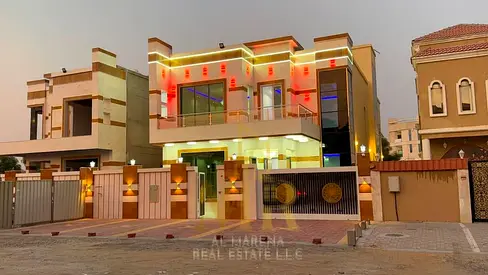 Freehold villa in Al Rawda 1 featuring a swimming pool, two floors, and a rooftop terrace. Includes